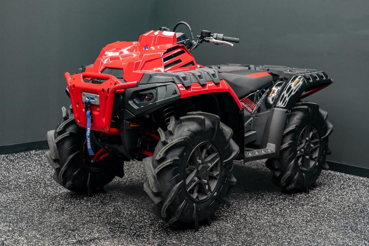 Polaris Sportsman XP 1000 Mud Edition riding through mud near Baton Rouge